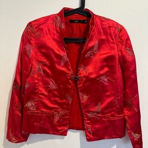 Red Jacket with Glossy Finish and Fitted Silhouette